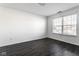 Spacious bedroom featuring dark grey laminate floors at 1292 Bearsden Cir, Avon, IN 46123