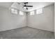 Spacious basement room with neutral carpet and ceiling fan at 132 W 41St St, Indianapolis, IN 46208