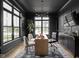 Stylish home office features a large desk, comfortable chairs, and plenty of natural light at 14028 Grannan Ln, Carmel, IN 46074