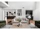 Open living room with a view of the kitchen and a neutral color palette at 14028 Grannan Ln, Carmel, IN 46074