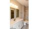 Elegant bathroom with a walk-in shower, tiled flooring, and white vanity at 1578 Palmetto Way, Greenfield, IN 46140