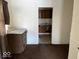 Dining room with brown carpet and view of the kitchen at 1610 Hoefgen St, Indianapolis, IN 46203