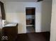Dining room with view into kitchen, needing updates at 1610 Hoefgen St, Indianapolis, IN 46203