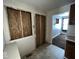 Kitchen area undergoing renovation, exposed studs at 1610 Hoefgen St, Indianapolis, IN 46203