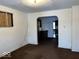 Spacious living room with view into kitchen at 1610 Hoefgen St, Indianapolis, IN 46203