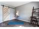 Bedroom with yoga mat and barn door at 1654 Iowa St, Indianapolis, IN 46203
