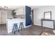 Modern kitchen with gray cabinets, white counters, and patterned backsplash at 1654 Iowa St, Indianapolis, IN 46203