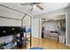 bedroom with bunk bed, closet, and dresser; hardwood floors at 18 Round Hill Ct, Danville, IN 46122