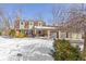 Two-story brick house with double garage and snowy front yard at 18 Round Hill Ct, Danville, IN 46122