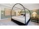 Bedroom with canopy bed and neutral color scheme at 18932 Seaforth Way, Westfield, IN 46074