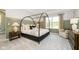 Main bedroom with canopy bed and large window at 18932 Seaforth Way, Westfield, IN 46074