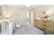 Neutral-toned Bedroom with a crib and plenty of storage at 18932 Seaforth Way, Westfield, IN 46074