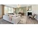 Living room with fireplace, large windows, and neutral decor at 18932 Seaforth Way, Westfield, IN 46074