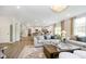 Open concept living room with hardwood floors and access to kitchen at 18932 Seaforth Way, Westfield, IN 46074