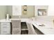 Home office with built-in desk and calming decor at 18932 Seaforth Way, Westfield, IN 46074