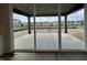 A covered back patio with a concrete foundation, offering outdoor living space and views of the surrounding neighborhood at 19962 Stone Side Ct, Westfield, IN 46074