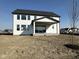 Backyard featuring a covered patio and plentiful windows at 19962 Stone Side Ct, Westfield, IN 46074