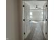 This bedroom has a ceiling fan and large windows that provide plenty of natural light at 19962 Stone Side Ct, Westfield, IN 46074