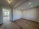 Bright living room featuring white walls and trim, recessed lighting, and an open entryway at 19962 Stone Side Ct, Westfield, IN 46074