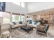 Open concept living room with views into the kitchen and access to backyard at 19962 Stone Side Ct, Westfield, IN 46074