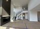 Spacious living area featuring a staircase, fireplace, high ceilings, and modern finishes at 19962 Stone Side Ct, Westfield, IN 46074