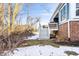 Backyard view featuring a deck with outdoor furniture, stairs, and snow on the ground at 20188 Hampton Park Dr, Westfield, IN 46074