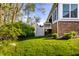 A backyard featuring a deck with white railings and lush greenery at 20188 Hampton Park Dr, Westfield, IN 46074