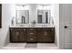 Modern bathroom features dual vanities, granite countertops, and contemporary mirrors at 20188 Hampton Park Dr, Westfield, IN 46074