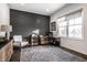 Bright home office featuring a large window, neutral walls, and a comfortable workspace with ample storage at 20188 Hampton Park Dr, Westfield, IN 46074