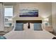 Bright bedroom with a large bed and calming decor at 2450 Carrollton Ave, Indianapolis, IN 46205