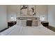 King size bed with stylish decor in bedroom at 2450 Carrollton Ave, Indianapolis, IN 46205