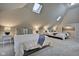 Two-bed attic bedroom with skylights and great natural light at 2450 Carrollton Ave, Indianapolis, IN 46205