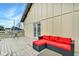 Deck with a sectional sofa and small table, perfect for relaxing at 2450 Carrollton Ave, Indianapolis, IN 46205