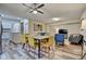 Open concept dining area with a view into the living room and kitchen at 2450 Carrollton Ave, Indianapolis, IN 46205