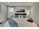 Spacious main bedroom with king bed and window at 2450 Carrollton Ave, Indianapolis, IN 46205