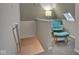 Cozy sitting area with chair and ottoman at 2450 Carrollton Ave, Indianapolis, IN 46205