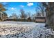 Snow covered backyard with wooden fence and shed at 2934 S Irwin St, Indianapolis, IN 46203