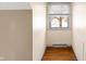 Small bedroom with hardwood floors and window at 2934 S Irwin St, Indianapolis, IN 46203