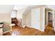 Bedroom with hardwood floors, built-ins, and window at 2934 S Irwin St, Indianapolis, IN 46203