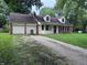 Charming single-Gathering home with brick accents, dormer windows and an attached two-car garage at 2934 S Irwin St, Indianapolis, IN 46203