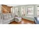 Spacious living room featuring a large sectional sofa and wood floors at 2934 S Irwin St, Indianapolis, IN 46203