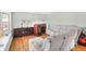 Living room with sectional sofa, hardwood floors, and a brick fireplace at 2934 S Irwin St, Indianapolis, IN 46203