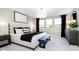 Spacious main bedroom with a king-size bed and large windows at 3292 Morab Dr, Zionsville, IN 46077