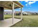 Covered patio overlooks the spacious backyard at 3844 Albert Ln, Bargersville, IN 46106