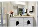 Modern bathroom with double vanity, large mirror, and glass shower at 3844 Albert Ln, Bargersville, IN 46106