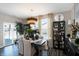 Bright dining room with a large table, chandelier, and built-in shelving at 3844 Albert Ln, Bargersville, IN 46106