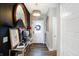 Bright entryway with modern console table and mirror at 3844 Albert Ln, Bargersville, IN 46106