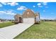 Inviting brick home with a two-car garage, nestled on a well-maintained lot in a friendly neighborhood setting at 3844 Albert Ln, Bargersville, IN 46106