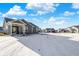 Gray house exterior with covered patio and snowy yard at 3844 Albert Ln, Bargersville, IN 46106