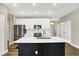 Well-lit kitchen boasting a center island, stainless steel appliances and white subway tile backsplash at 3844 Albert Ln, Bargersville, IN 46106